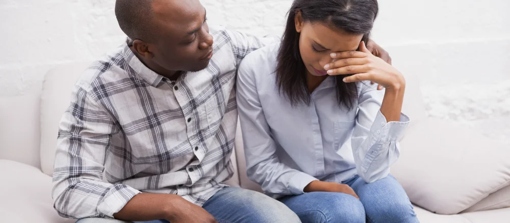 Upset woman with her therapist in the office