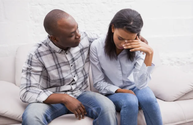 Upset woman with her therapist in the office