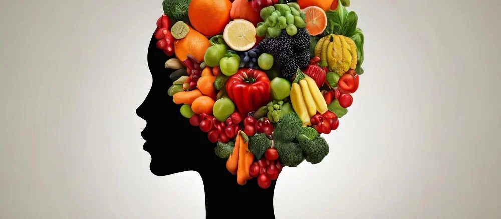 Nutritionists concept silhouette head made of fruits vegetables Creative health symbolism genera