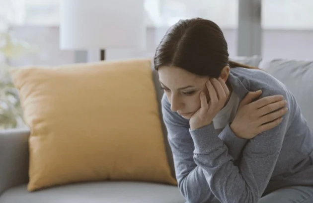 Sad Anxiety woman self isolating at home