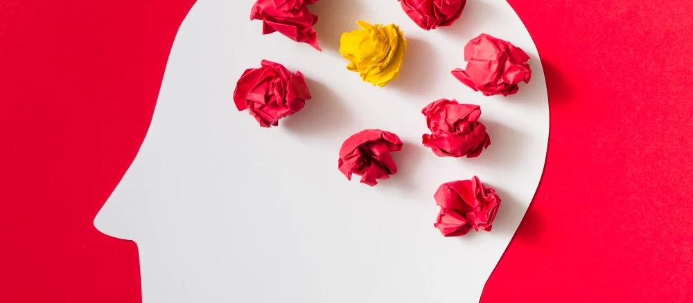 Directly above shot of heart shapes on yellow background