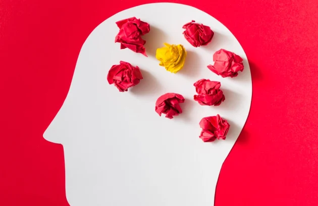 Directly above shot of heart shapes on yellow background