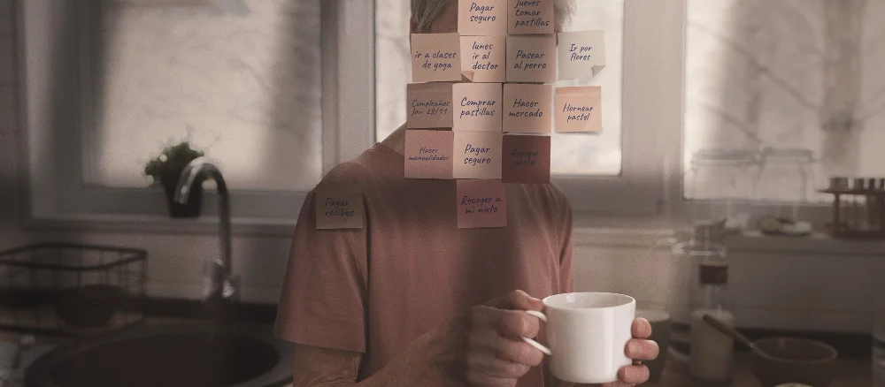 Side view man posing with notes on face