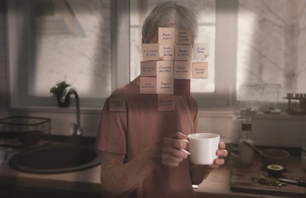 Side view man posing with notes on face
