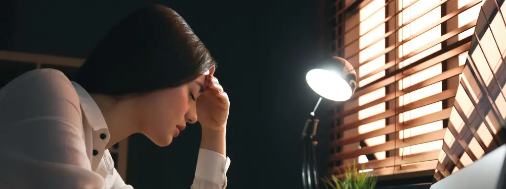 Tired businesswoman stressing out at workplace late in evening Banner design